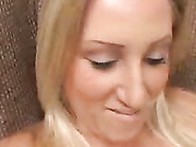 Blonde slut rubs a stiff penis