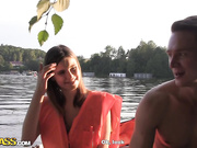 Skinny girl gets nailed in the boat in a MMF threesome