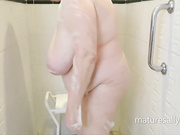 Granny Sally soaps up in the shower