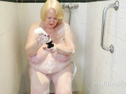 Granny Sally soaps up in the shower