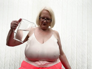 Granny Sallys huge dangly tits get very wet under her skimpy
