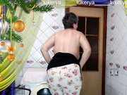 Hot housewife Lukerya brings a festive mood showing off red