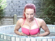 Sexy MILF with big chest bating in bath