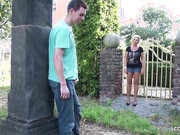 Mother catches stepson jerking off in the garden and lets